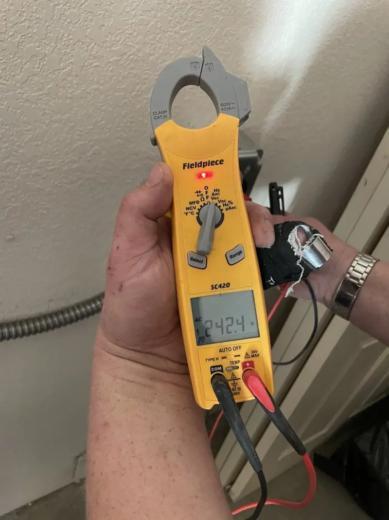 Voltage testing with clamp meter during Generator Installation in East Richmond Heights